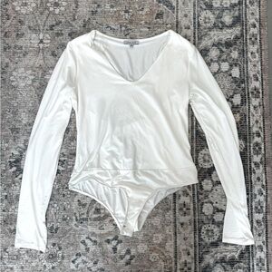 NWOT! Boutique Long Sleeve Bodysuit
